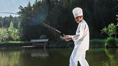 A chef is fishing