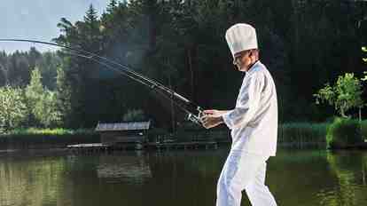 A chef is fishing